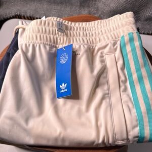 Adidas Cream Track Pants with Blue Stripes